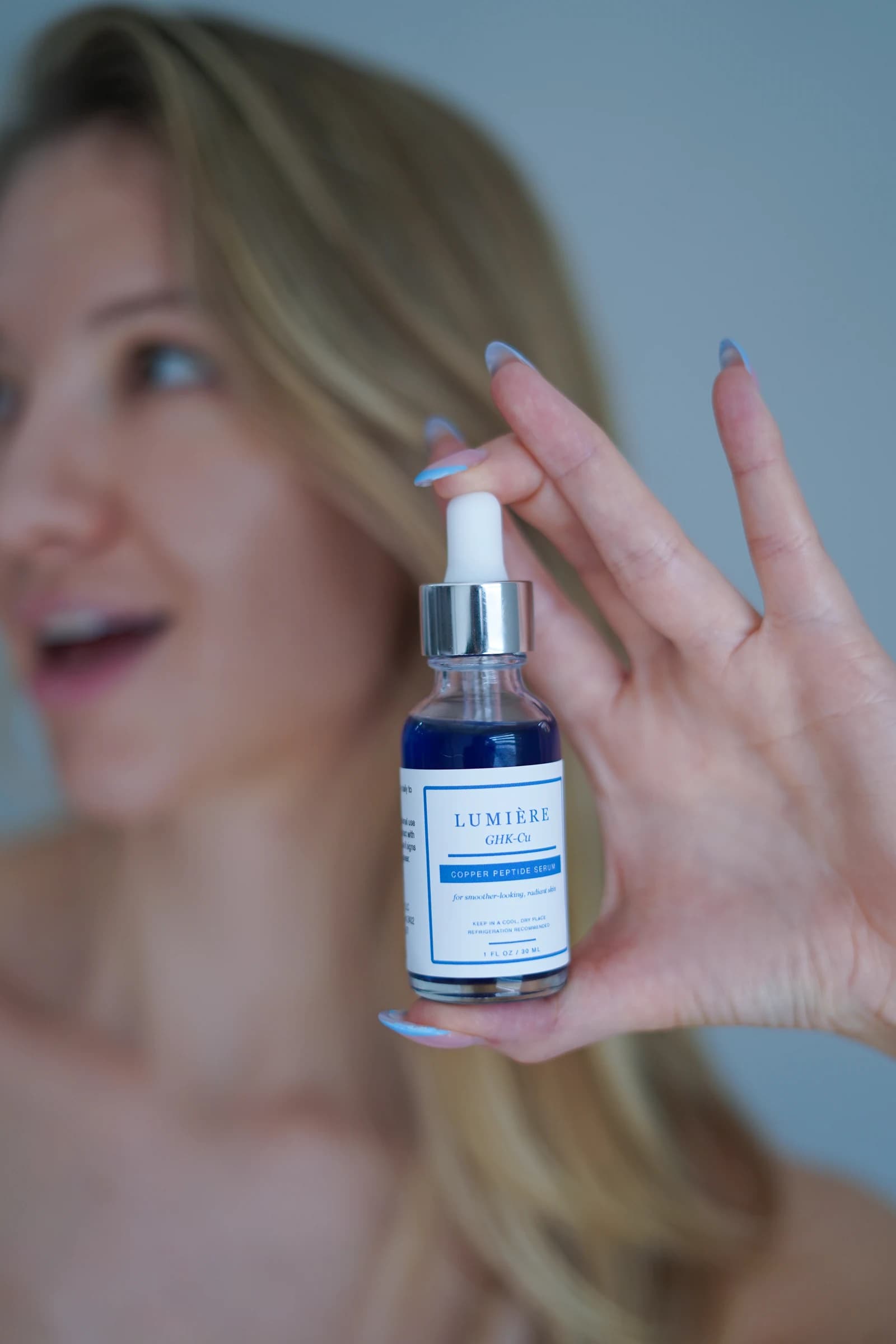 A portrait from the Lumiere Routine skincare photography collection